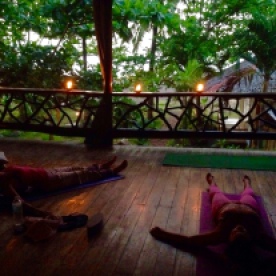 Yin Yoga overlooking the sea and the resort garden, Philippines